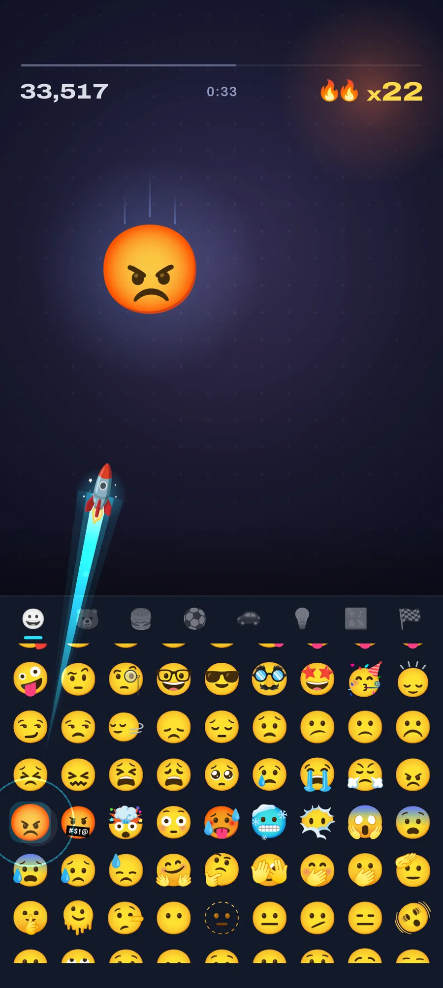 An angry face falls while a rocket shoots up from its key on the emoji keyboard, with a 22× combo.